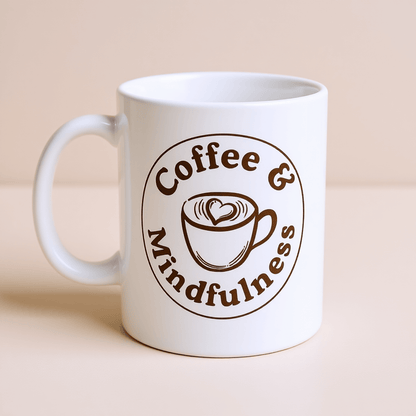 Coffee & Mindfulness Mug™ | Karma & Grace™ — front view of white ceramic mug with mindful emblem
